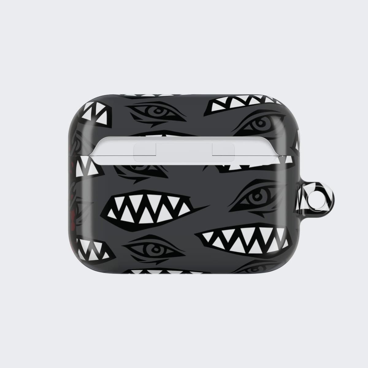 The Cursed Gaze Case for AirPods Pro 2, seen from the back, chains crossing around a small skull charm